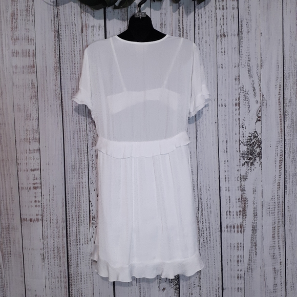 Show me your MuMu Virginia mini flowy ruffle dress w/ speckled dots in white - Picture 7 of 12
